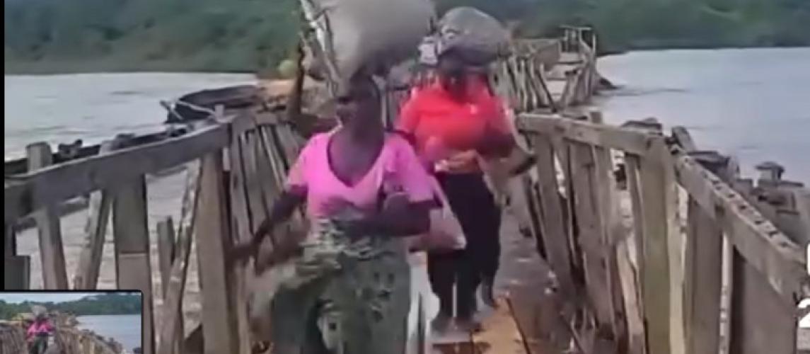 Torrenntial rains wiped away the wooden bridge over the Benson River, as floods from the Atlantic Ocean surged inland, cutting off access and endangering local farmers.