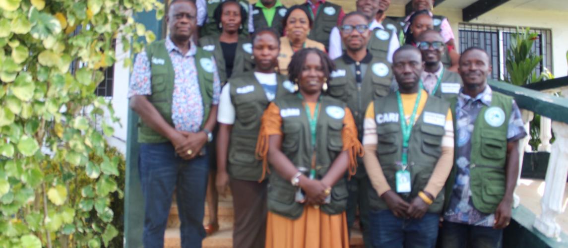 Dr. Arthur Bob Karnuah and Dr. James S. Dolo are flanked by research officers and research assistants ahead of departure for the survey, at CARI's Science Building in Suakoko